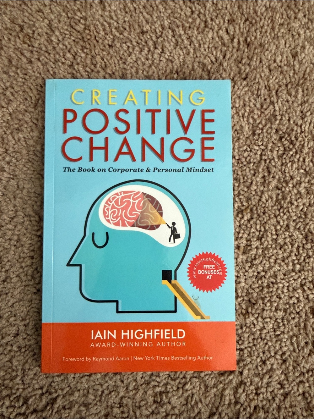 Creating Positive Change by Iain Highfield - Turquoise & Orange Paperback
